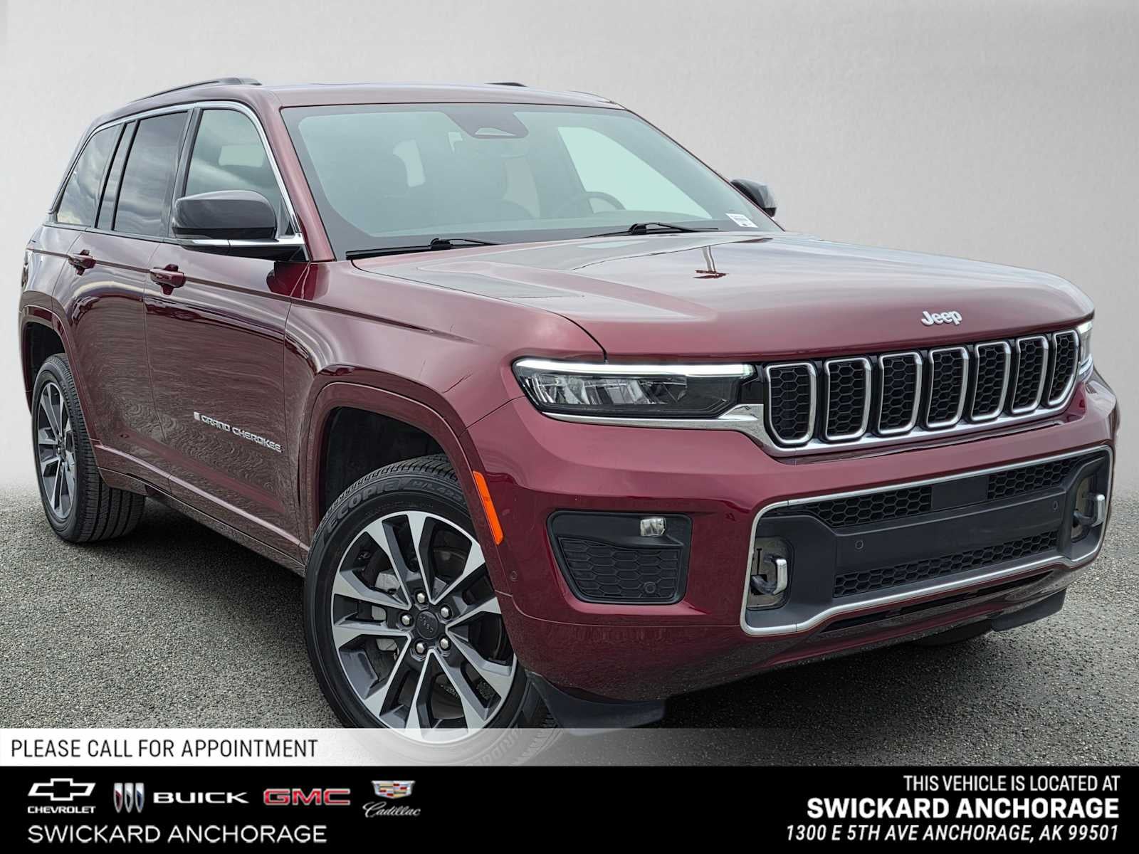 2025 Jeep Grand Cherokee Overland 4x4 in Red — front three-quarter view