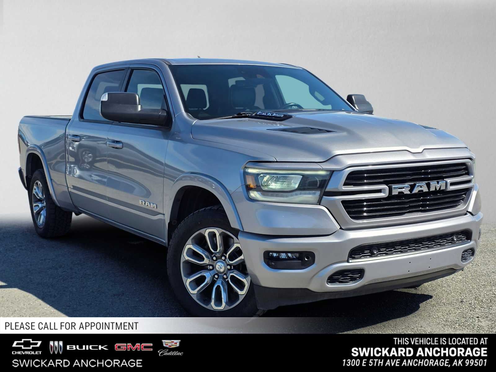 2022 RAM 1500 Laramie in Billet Silver M — front three-quarter view