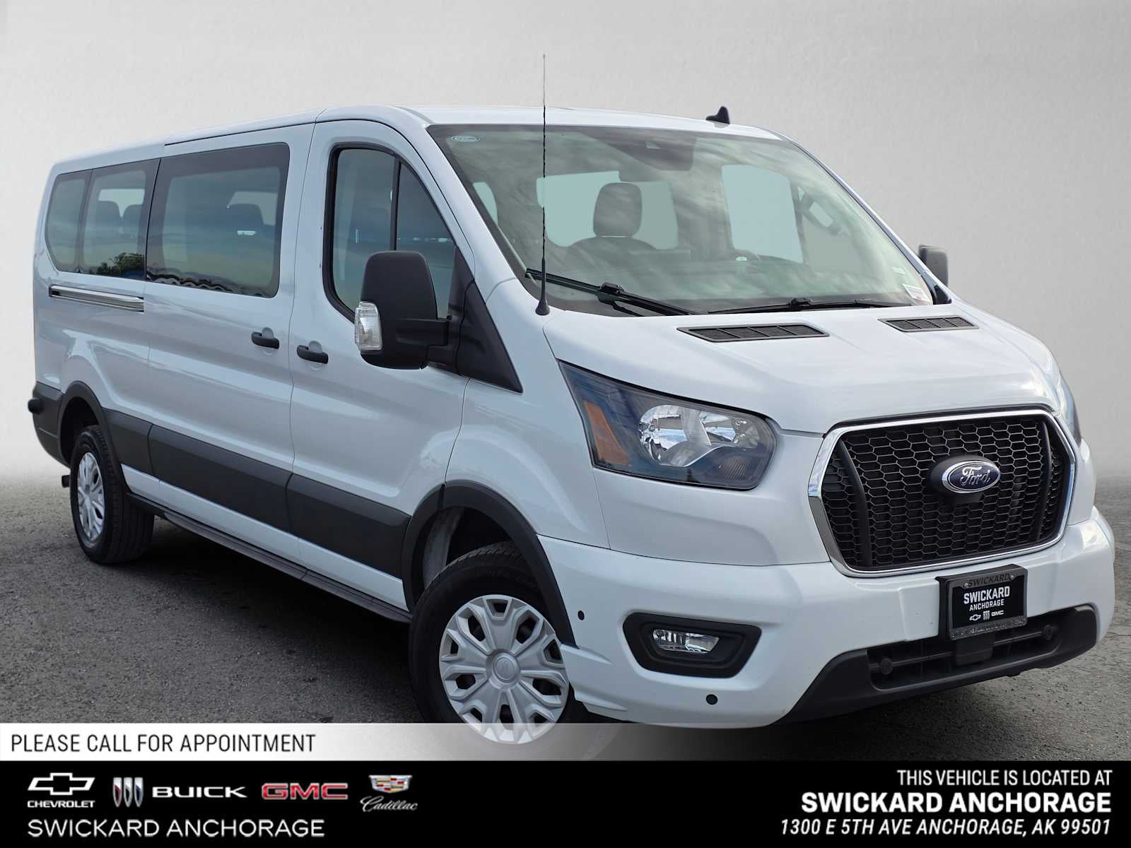 2024 Ford Transit Passenger Wagon XL in Oxford White — front three-quarter view