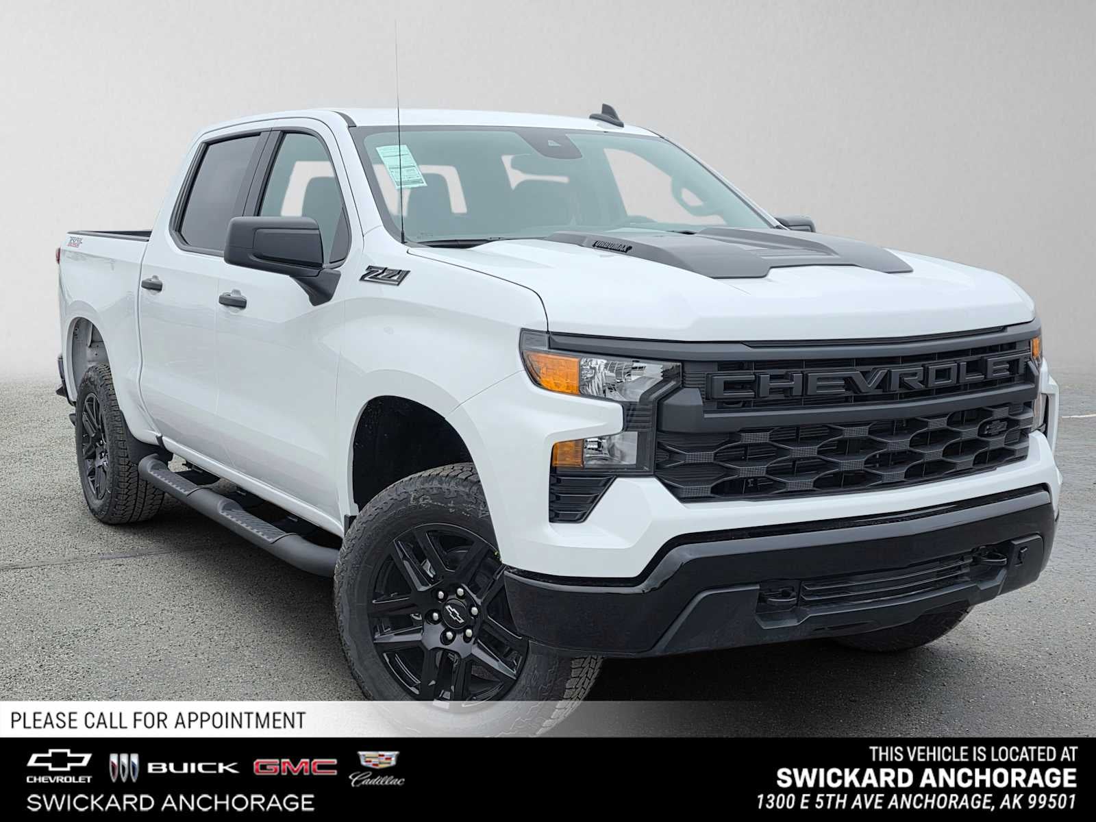 2026 Chevrolet Silverado 1500 Custom Trail Boss in Summit White — front three-quarter view